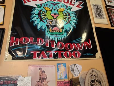 Hold It Down Tattoo Studio