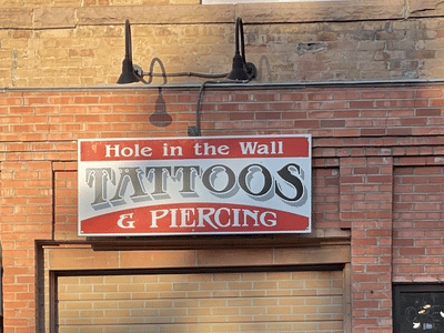 Hole In the Wall Tattoos and Piercing, LLC