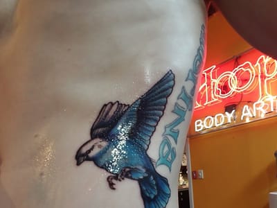 Hoops Tattoo and Piercing