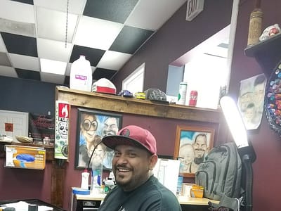 INK REVOLUZION TATTOOS LLC