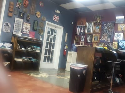 INK REVOLUZION TATTOOS LLC