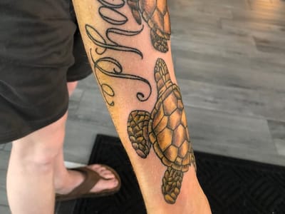 Into You Piercing and Tattoo