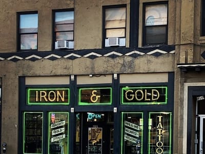 Iron and Gold Tattoo