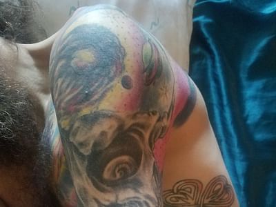 Iron & Ink Custom Tattoo And piercing.