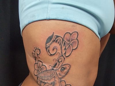 Island Tat Evolve (tattoo)