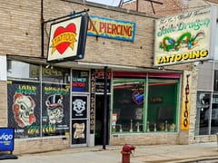 Jade Dragon Tattoo and Body Piercing