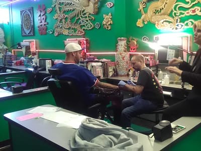 Jade Dragon Tattoo and Body Piercing