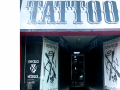 Knuckles & Needles Tattoo Parlor