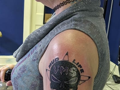 Lay Down Sally Tattoo Parlor