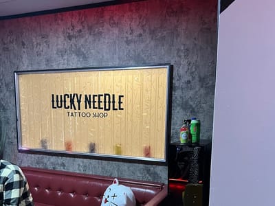 Lucky Needle Tattoo