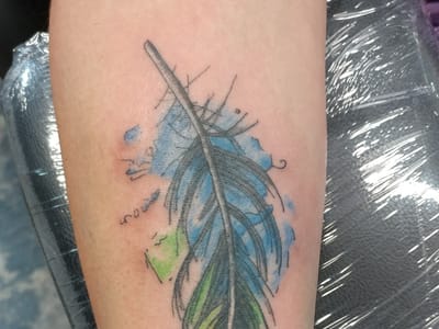 Malcolm's Tattoos and Piercings