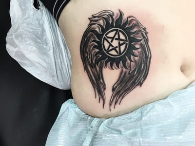 Man's Ruin Tattoo & Piercing