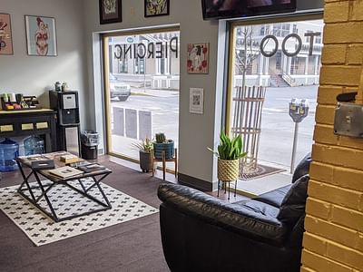 Marigold Adornment Tattoo, Piercing, & Jewelry.