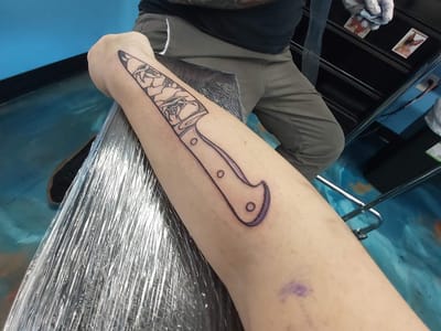 Mermaid's Mark Tattoo Parlor