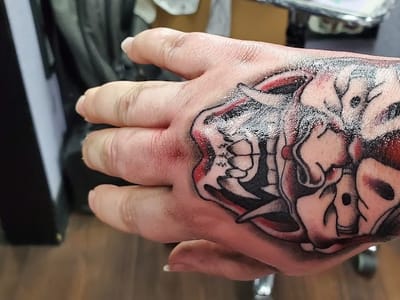 Modified Design Tattoo & Piercing