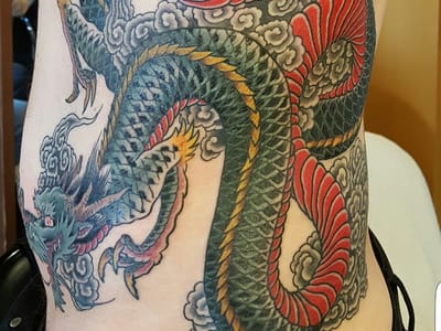 Moth and Dagger Tattoo Studio