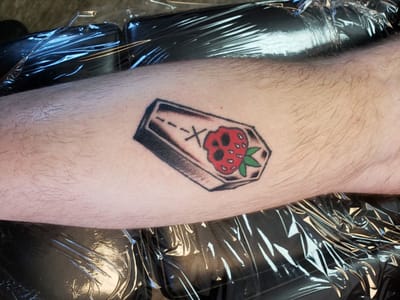 Muskegon Electric Coil Tattoo & Body Piercing, LLC