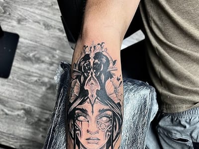 N.L.O.T.L. New Lady of the Lake Tattoos