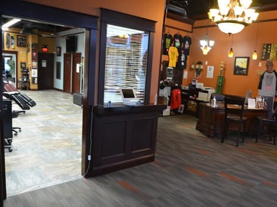 Neon Dragon Tattoo & Body Piercing