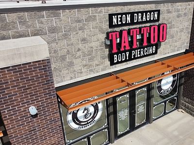 Neon Dragon Tattoo & Body Piercing
