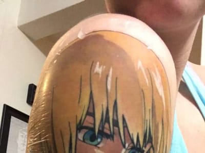 Neon Scorpion Tattoo Collective