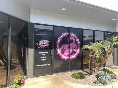 Neon Scorpion Tattoo Collective