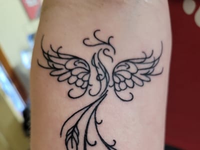 Newage Tattoos and Body Piercings