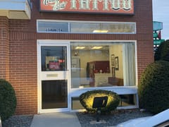 Nomadic Roots Tattoo