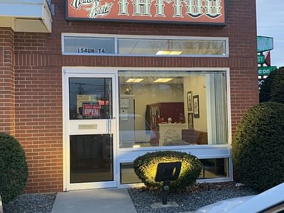 Nomadic Roots Tattoo