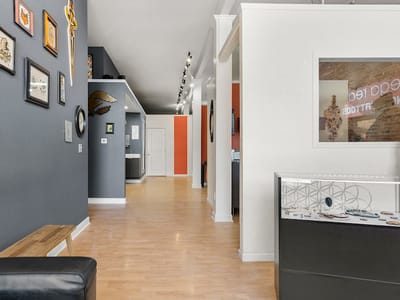 Omega Red Piercing & Tattoo