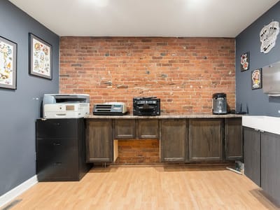 Omega Red Piercing & Tattoo