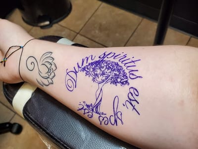 Outlaw Custom Tattoo