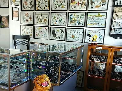 Outwest Tattoo and body piercing ,30 years of tattooing,only life time guarantee