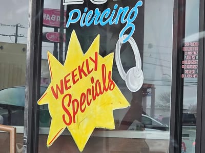 Pain & Pleasure Tattoo Parlor