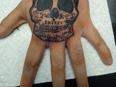 Painless Wayne's Tattoo and Body Piercing