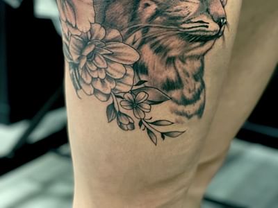Panda's Den Tattoo