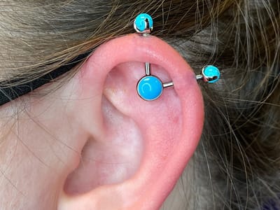 Piercings by Paige Amber at Big Guns Tattoo