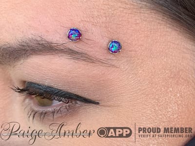 Piercings by Paige Amber at Big Guns Tattoo