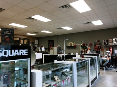 Powers Tattoos & Body Piercing Studio