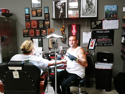 Powers Tattoos & Body Piercing Studio