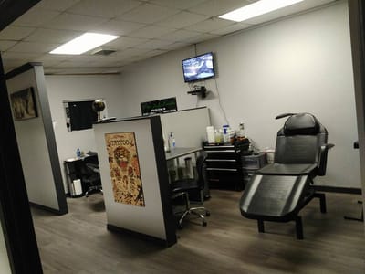 Powers Tattoos & Body Piercings Studio