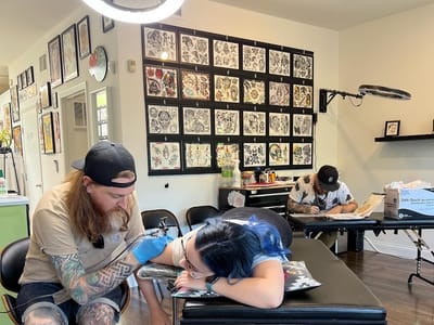 Promised Land Tattoo and Piercing