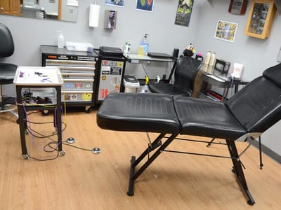 Purple Monkey Tattoo and Body Piercings