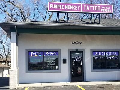 Purple Monkey Tattoo and Body Piercings