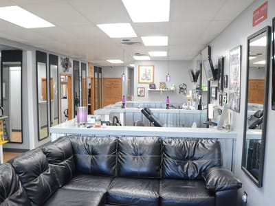 Purple Monkey Tattoo and Body Piercings