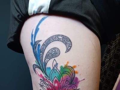 Purple orchid tattoo and piercing