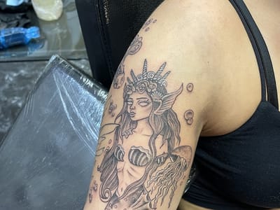 Queen of Hearts Tattoo & Piercings