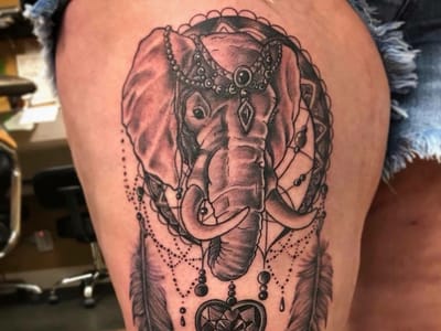 Queen of Hearts Tattoos & Body Piercing