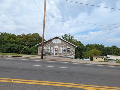 Queen of Hearts Tattoos & Body Piercing
