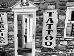 Queen of Hearts Tattoos & Body Piercing